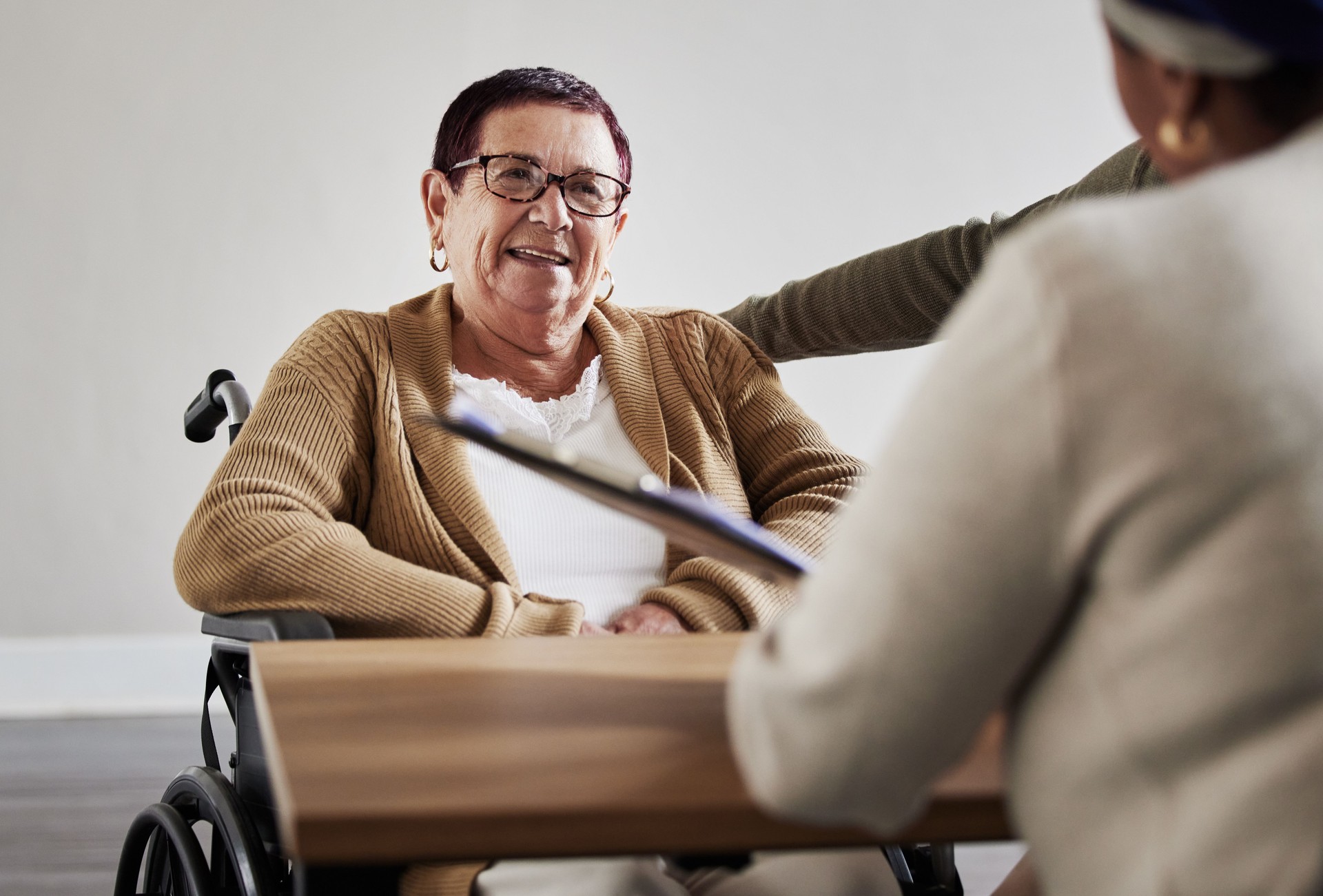 Disability consulting, legal meeting or senior woman planning on documents for compensation, will application agreement. Lawyer, financial advisor or consult for insurance, retirement deal or pension